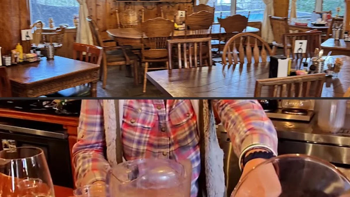 Mountain lodge interior with beer hall seating.